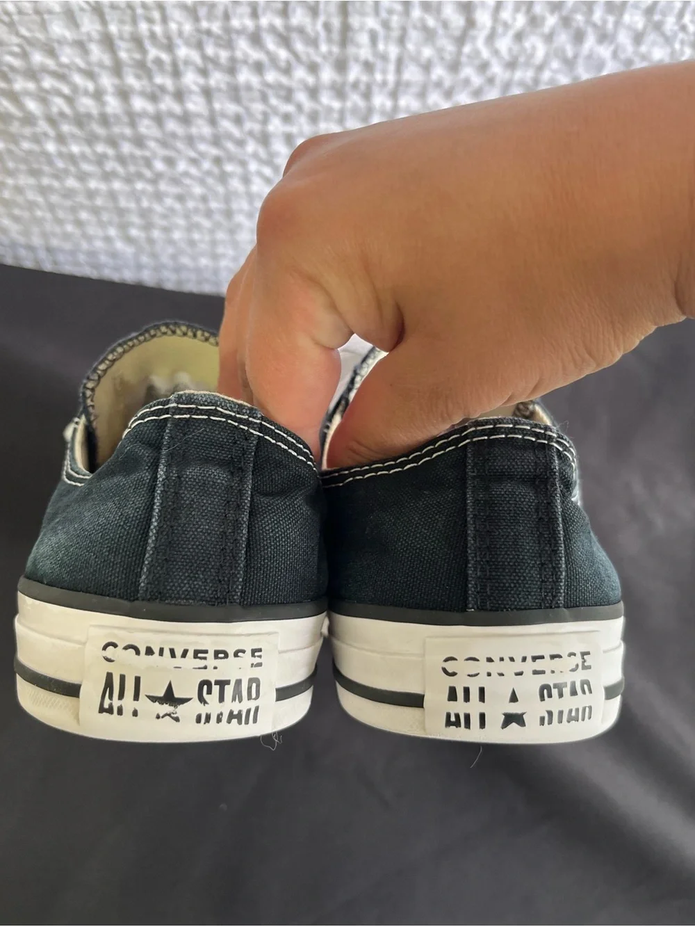 Converse woman’s Chuck Taylor All Star Low Top Sneakers in Black